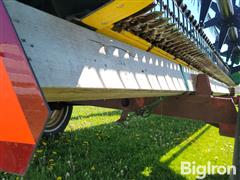 items/84a2bf444a0ef0119d476045bd488df1/john-deere-920-flex-header-w-cart_b085ad3367eb45dcba169d3753ae8806.jpg