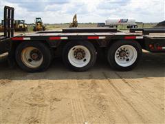 items/85d385d22a34ef11a2960022488fe55b/2012nuttall350lb46tri-axlelowboytrailer_00d959980c0d4a8296f7c877b46b3d78.jpg