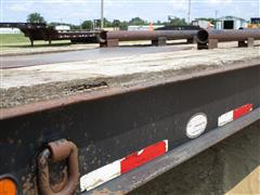 items/85d385d22a34ef11a2960022488fe55b/2012nuttall350lb46tri-axlelowboytrailer_be551582549b4f94bbb40bad6b324606.jpg