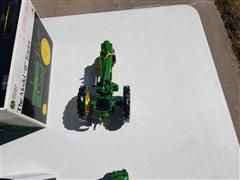 items/8bcc4779f9e6ed11a81c6045bd4cc723/ertljohndeeremodelbmodel630tractormodeltoy_5ead2c98aab04b75811d663c4816cd0b.jpg