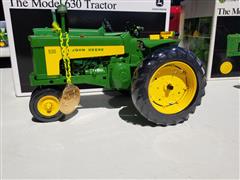 items/8bcc4779f9e6ed11a81c6045bd4cc723/ertljohndeeremodelbmodel630tractormodeltoy_889cdade5bf9413593bfb444ff7e9d75.jpg