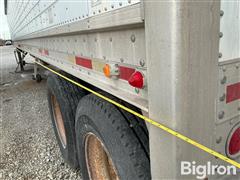 items/8bd6267519184ce78692b3361adfddfb/merrit43x96x68x25xxmgs43hopperbottomag-graintrailer_27f841b1e5984e6d99bb2dd08f5e64c5.jpg