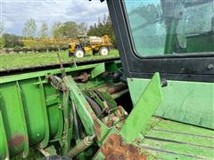 items/8f5529321511ef11989a000d3ad43525/johndeere2320wind-rowerw300twinknifeheader_8ffbd95d4483461da793b87b7b269cdd.jpg