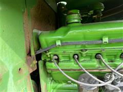 items/8f5529321511ef11989a000d3ad43525/johndeere2320wind-rowerw300twinknifeheader_c60ae97f0fb94b90b8728f72e8b35e71.jpg