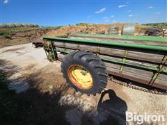 items/9180a1bd8a3cf011a2d97c1e5239afe0/john-deere-manure-spreader_7fd88ffd0ec84f15a474c4326c43a4a0.jpg
