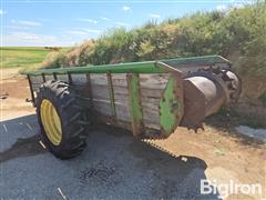items/9180a1bd8a3cf011a2d97c1e5239afe0/john-deere-manure-spreader_d3a35680ab994f428310fac29e2fce12.jpg