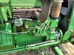 items/91e5459806f2ed11a81c00224890e11c/1980johndeere8502wdtractor_47d6ef17568e4b9290aa4950f25e487e.jpg