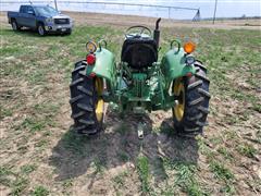 items/91e5459806f2ed11a81c00224890e11c/1980johndeere8502wdtractor_e26e0eb36a3c49d28f4d35075a6432ff.jpg