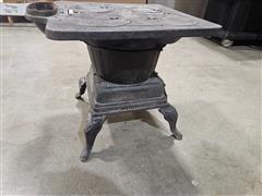 items/92852222c4ffed11a81c000d3a62cc61/antiquecastironcookingstove_e8496b422f02415bb99c033983ca2835.jpg