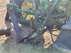 items/9982bb2212cced11a81c6045bd4cc723/1967johndeere30202wdtractorwloaderattachments_64bf5243e0424a658318a39433245aaf.jpg