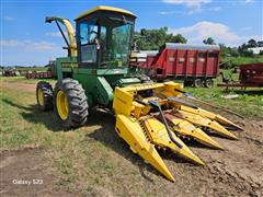 items/9c48efa8385bef11a4e6000d3a62e002/johndeere5720selfpropelledforageharvesterwnewholland360nforageheader_18508cacc0cc43689968beb70bb44a52.jpg