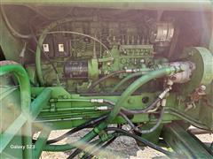 items/9c48efa8385bef11a4e6000d3a62e002/johndeere5720selfpropelledforageharvesterwnewholland360nforageheader_2a428590d5a048fcaf988d9591b55bda.jpg