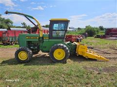 items/9c48efa8385bef11a4e6000d3a62e002/johndeere5720selfpropelledforageharvesterwnewholland360nforageheader_463bbd36f3ff4d48a67061a48c417c1a.jpg