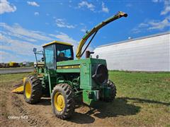 items/9c48efa8385bef11a4e6000d3a62e002/johndeere5720selfpropelledforageharvesterwnewholland360nforageheader_754ab123af054cf788ba5ccbd93facd2.jpg