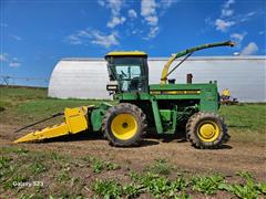 items/9c48efa8385bef11a4e6000d3a62e002/johndeere5720selfpropelledforageharvesterwnewholland360nforageheader_acc6ab35e3d942abb805655634b3eecf.jpg