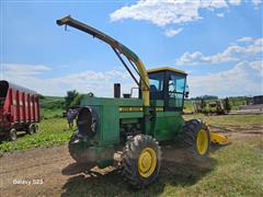 items/9c48efa8385bef11a4e6000d3a62e002/johndeere5720selfpropelledforageharvesterwnewholland360nforageheader_e4a6e418df994a1dbd8175286bd38ea8.jpg