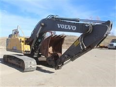 items/9d180b475b52ec11a3ee0003fff903d6/volvoec220elbackhoe_fed6591de6e8445383f4f8b6c56a2e3c.jpg