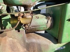 items/9eea9ca9855442e2b50ba5ac9cea440f/1947johndeeremttractorwbladesicklemower2-bottomplow_22b49a7af9834dfb9c321eadfdf1d557.jpg