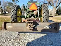 items/9eea9ca9855442e2b50ba5ac9cea440f/1947johndeeremttractorwbladesicklemower2-bottomplow_ada88091090343338bd5faae61c90859.jpg