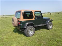 items/b3ec23858e40ef11b4ad0022488ff517/1993jeepyjwrangler_14c77ec751a84a5f8275373b8726f4b9.jpg