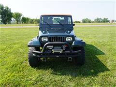 items/b3ec23858e40ef11b4ad0022488ff517/1993jeepyjwrangler_979053f5df8a42fb8f453f40f73fc61d.jpg