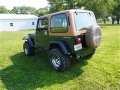 items/b3ec23858e40ef11b4ad0022488ff517/1993jeepyjwrangler_f7af3a6a87e748f2abf042f5327728e8.jpg