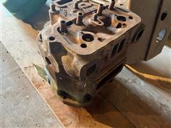 items/b435dce4da5cee11a81c6045bd4a636e/johndeere620gascylinderandhead_c3c5c505cc514a87af41b0c796dce3e2.jpg