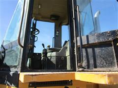 items/b44d896a346dee11a81c00224890f82c/2005caterpillar938g4wdwheelloader_2cd8731ccb954d36adf455dfad9e6e92.jpg