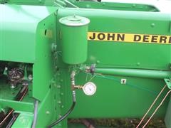 items/b8537e0ba3a9eb1189ee00155d42e7e6/johndeere348smallsquarebalerwithaccululator_35e1c7e138a64152abb6f890db4d1867.jpg