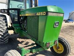 items/c2aca9233dd5ed11a81c6045bd4bc5ad/1983johndeere42502wdtractor-5_9e6fd777e12b485796cbcfbb1057f40c.jpg