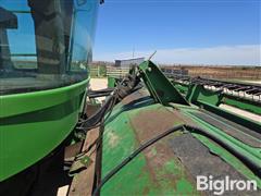 items/c442c2b3383af011a2d97c1e5239afe0/1997-john-deere-4890-self-propelled-windrower-3_2704e6676f2040ca93c14a7a5ac31640.jpg