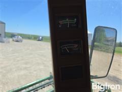 items/c442c2b3383af011a2d97c1e5239afe0/1997-john-deere-4890-self-propelled-windrower-3_2d2df3d800ee4eaf9ba03be3347956a6.jpg