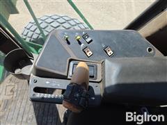 items/c442c2b3383af011a2d97c1e5239afe0/1997-john-deere-4890-self-propelled-windrower-3_47c2008ddc384fbebc81beb08201c4ad.jpg