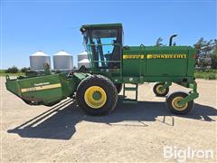 items/c442c2b3383af011a2d97c1e5239afe0/1997-john-deere-4890-self-propelled-windrower-3_488aa4c83a924956849608ee34ae599c.jpg