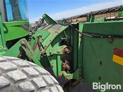 items/c442c2b3383af011a2d97c1e5239afe0/1997-john-deere-4890-self-propelled-windrower-3_57d9183f1b4041c2862c780c4ed15acd.jpg