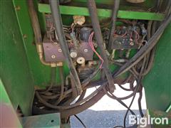 items/c442c2b3383af011a2d97c1e5239afe0/1997-john-deere-4890-self-propelled-windrower-3_65a66b0e3d164393a2572cc6cb86bebc.jpg