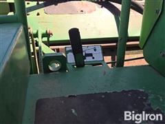 items/c442c2b3383af011a2d97c1e5239afe0/1997-john-deere-4890-self-propelled-windrower-3_8b558a9f240545b8bdac5466fe88fa2d.jpg