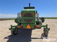 items/c442c2b3383af011a2d97c1e5239afe0/1997-john-deere-4890-self-propelled-windrower-3_97d90b56614546bb82372c84f9574d22.jpg