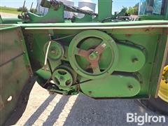 items/c442c2b3383af011a2d97c1e5239afe0/1997-john-deere-4890-self-propelled-windrower-3_ca554e62af4a43d19b84c80dff20292c.jpg