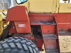 items/c4ddcf73c99eeb1189ee00155d424509/newholland1116windrower-2_ec01c56026cd4d29be1e274baaf18828.jpg