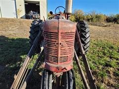 items/c5a47dd57d3bec11a3ee0003fff903d6/1949farmallinternationalharvesterm2wdtractorwloader_28ba2f049cb843fb950dfe120c4e612d.jpg