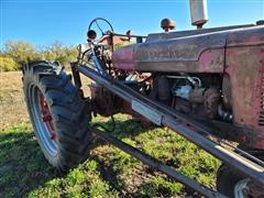 items/c5a47dd57d3bec11a3ee0003fff903d6/1949farmallinternationalharvesterm2wdtractorwloader_f5a767de50a84507ba8cdac65dadf329.jpg