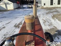 items/cad993391bd7441a997ebe1d02f435d7/1963-farmall-560-2wd-tractor_4fc261f72b814439a88b528622347e69.jpg