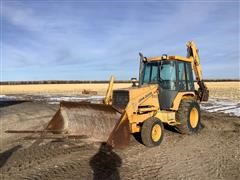 1986 John Deere 310C 2WD Loader Backhoe W/Bale Spears 