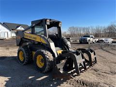 items/d42c96ff4cb2ed119ac40003fff922e3/2002newhollandl190superboomskidsteer_d792d2b4ac134653b62d709818ed8979.jpg