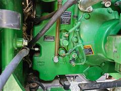 items/d4b01e999b57ef11a4e60022488ec0a9/2010johndeere93304wdtractor-11_e5341c83eca84bc4b96ce059fde355cf.jpg