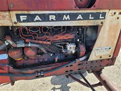 items/d9a5a80063deed11a81c00224890e11c/farmall6562wdtractor-4_67d63c608ddb445eb729fd3f30dfc6ec.jpg