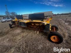 2009 New Holland 750HD Discbine Head & Trailer 