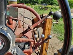 items/dcdb4169d6e5ec11b5cf00155d72f54a/1957farmall4502wdtractorwkoykersuperkloader_57f005adb0334101ae225b422e1ff192.jpg