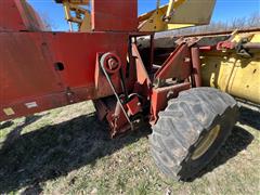 items/e518e44562d9ee11a73d0022489101eb/newholland910selfpropelledwindrower-2_6c436c28ee314d538c61445f6b542f55.jpg